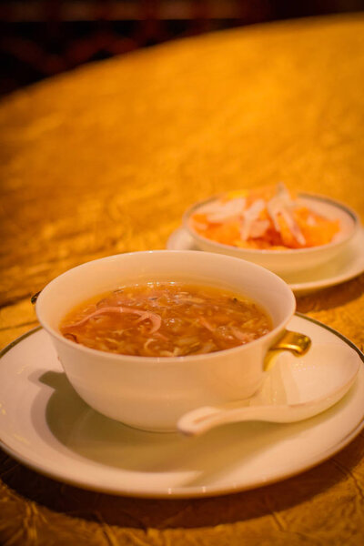 Braised mixed shredded snake meat soup with chrysanthemum
