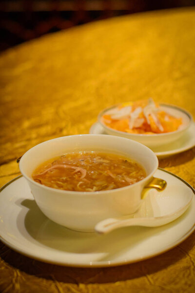 Braised mixed shredded snake meat soup with chrysanthemum