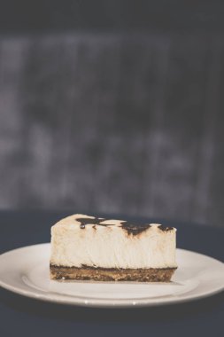 Nutella Peynir kek klasik chhese frosting tuzlu tereyağı bisküvi tabanının bir tabanında çikolata nutella girdapları ile karışık