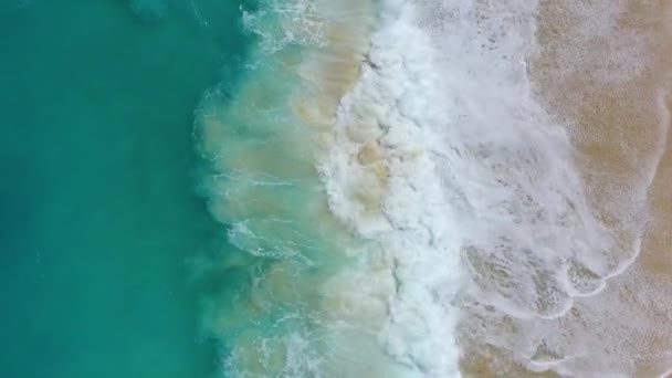 Coast as a background from top view. Turquoise water background from top view. Summer seascape from air. Nusa Penida island, Indonesia. Travel - video — Stock Footage Coast Background Top View Turquoise Water Background Top View Summer Royalty Free Stock Footage