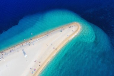 Croatia, Hvar island, Bol. Aerial view at the Zlatni Rat. Beach and sea from air. Famous place in Croatia. Summer seascape from drone. Travel - image clipart