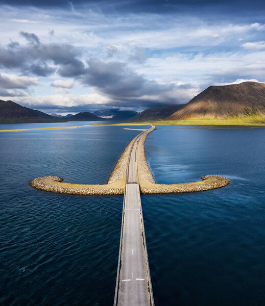 Iceland. Aerial view on the mountain and road. Landscape in the Iceland at the day time. Famous place in Iceland. Landscape from drone. Travel - image
