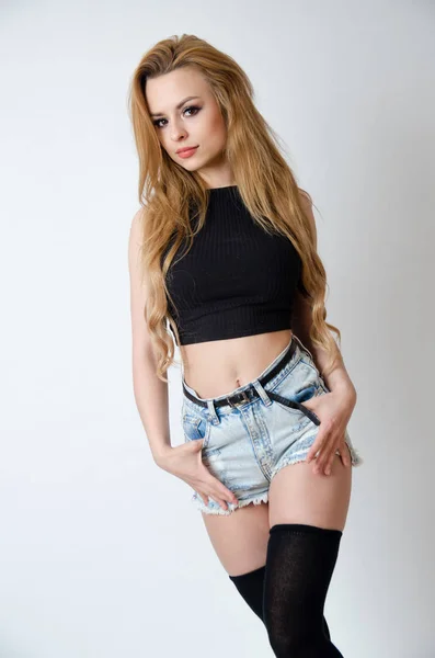 Girl with black top and jeans shorts — Stock Photo, Image