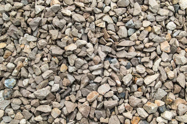 Kavics-és kövek textúra háttere — Stock Fotó