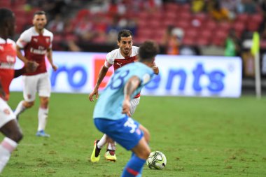 Kallang-Singapur-26Jul2018: Henrikh mkhitaryan # 7 cephanelik oyuncusunun icc2018 'de atletico de madrid' deki ulusal stadyumdaki cephaneliğe karşı eylemde olması