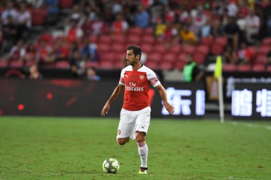 Kallang-Singapur-26Jul2018: Henrikh mkhitaryan # 7 cephanelik oyuncusunun icc2018 'de atletico de madrid' deki ulusal stadyumdaki cephaneliğe karşı eylemde olması