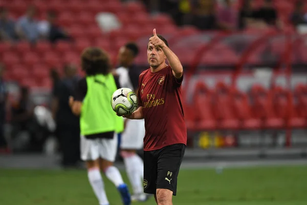 Kallang-Singapore-26Jul2018:Unidentified staff coach of arsenal in action during icc2018 between arsenal against at atletico de madrid at national stadium,singapore