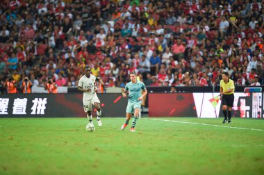 Kallang-Singapur-28 Haziran 2018: Hector bellerin # 2 cephanelik oyuncusu icc2018 'de Paris Saint-Almanya' daki ulusal stadyumdaki cephaneliğe karşı savaşıyor.
