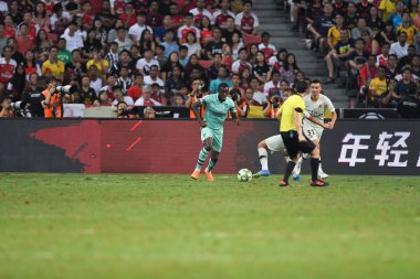 Kallang-Singapur-28 Temmuz 2018: Eddie nketiah # 49 cephanelik oyuncusu icc2018 'de Paris Saint-Alman Ulusal Stadyumu, Singapur' daki cephaneliğe karşı savaşıyor.