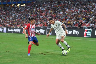 Kallang-Singapur-30Jul2018: Angel Di Maria # 11 PSG oyuncusu icc2018 'de Atletico Madrid ile Singapur' daki Paris Saint-Alman Ulusal Stadyumu 'nda karşı karşıya geldi.