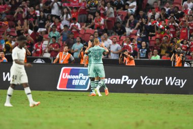 Kallang-Singapur-28 Haziran 2018: C2018 'de Paris Saint-Alman Millî Stadyumu, Singapur' daki cephanelikte gol atan Arsenal oyuncusu