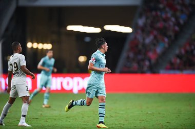 Kallang-Singapur - 28 Temmuz 2018: Mesut Ozil #10 oyuncu Arsenal icc2018 paris saint-Alman Ulusal Stadyumu'nda, Singapur karşı arsenal arasında sırasında eylem
