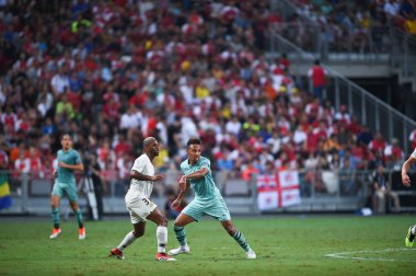 Kallang-Singapur-28 Temmuz 2018: Pierre-Emerick Aubameyang # 14 cephanelik oyuncusunun icc2018 'de Paris Saint-Alman Ulusal Stadyumu, Singapur' daki cephaneliğe karşı çarpışması