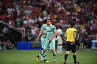 Kallang-Singapur-28 Haziran 2018: C2018 'de Paris Saint-Alman Millî Stadyumu, Singapur' daki cephanelikte gol atan Arsenal oyuncusu