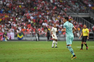 Kallang-Singapur - 28 Temmuz 2018: Mesut Ozil #10 oyuncu Arsenal icc2018 paris saint-Alman Ulusal Stadyumu'nda, Singapur karşı arsenal arasında sırasında eylem