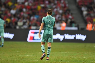 Kallang-Singapur-28 Haziran 2018: Hector bellerin # 2 cephanelik oyuncusu icc2018 'de Paris Saint-Almanya' daki ulusal stadyumdaki cephaneliğe karşı savaşıyor.
