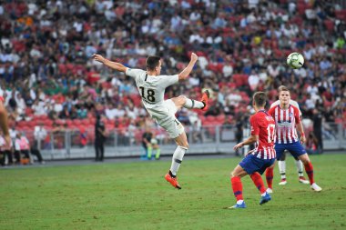 Kallang-Singapur-30Jul2018: Giovani lo celso # 18 PSG oyuncusu icc2018 'de Atletico Madrid ile Singapur' daki Paris Saint-Alman Ulusal Stadyumu 'nda karşılaştı.