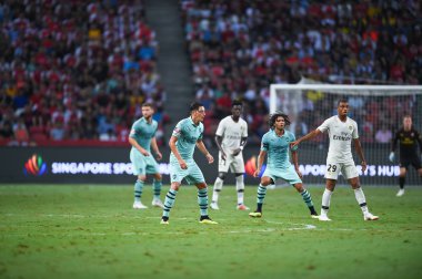 Kallang-Singapur - 28 Temmuz 2018: Mesut Ozil #10 oyuncu Arsenal icc2018 paris saint-Alman Ulusal Stadyumu'nda, Singapur karşı arsenal arasında sırasında eylem