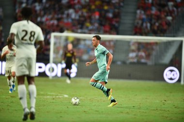 Kallang-Singapur - 28 Temmuz 2018: Mesut Ozil #10 oyuncu Arsenal icc2018 paris saint-Alman Ulusal Stadyumu'nda, Singapur karşı arsenal arasında sırasında eylem