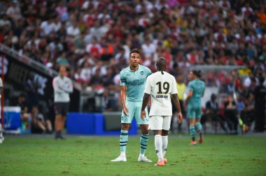 Kallang-Singapur-28 Temmuz 2018: Pierre-Emerick Aubameyang # 14 cephanelik oyuncusunun icc2018 'de Paris Saint-Alman Ulusal Stadyumu, Singapur' daki cephaneliğe karşı çarpışması