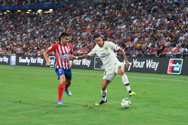 Kallang-Singapur-30Jul2018: Angel Di Maria # 11 PSG oyuncusu icc2018 'de Atletico Madrid ile Singapur' daki Paris Saint-Alman Ulusal Stadyumu 'nda karşı karşıya geldi.