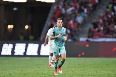 Kallang-Singapur-28 Haziran 2018: Hector bellerin # 2 cephanelik oyuncusu icc2018 'de Paris Saint-Almanya' daki ulusal stadyumdaki cephaneliğe karşı savaşıyor.
