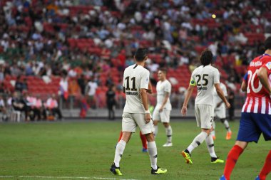 Kallang-Singapur-30Jul2018: Angel Di Maria # 11 PSG oyuncusu icc2018 'de Atletico Madrid ile Singapur' daki Paris Saint-Alman Ulusal Stadyumu 'nda karşı karşıya geldi.