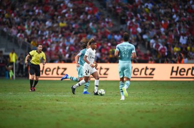 Kallang-Singapur-28Jul2018: Christopher Nkunku # 24 PSG Oyuncusu Buz 2018 'de Paris Saint-Alman Ulusal Stadyumu, Singgapur' daki cephaneliğe karşı savaşıyor