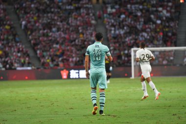 Kallang-Singapur - 28 Temmuz 2018: Mesut Ozil #10 oyuncu Arsenal icc2018 paris saint-Alman Ulusal Stadyumu'nda, Singapur karşı arsenal arasında sırasında eylem