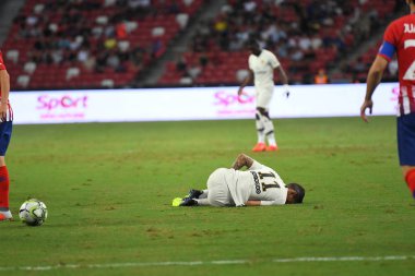 Kallang-Singapur-30Jul2018: Angel Di Maria # 11 PSG oyuncusu icc2018 'de Atletico Madrid ile Singapur' daki Paris Saint-Alman Ulusal Stadyumu 'nda karşı karşıya geldi.