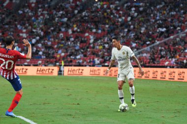Kallang-Singapur-30Jul2018: Angel Di Maria # 11 PSG oyuncusu icc2018 'de Atletico Madrid ile Singapur' daki Paris Saint-Alman Ulusal Stadyumu 'nda karşı karşıya geldi.