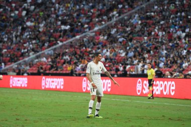 Kallang-Singapur-30Jul2018: Angel Di Maria # 11 PSG oyuncusu icc2018 'de Atletico Madrid ile Singapur' daki Paris Saint-Alman Ulusal Stadyumu 'nda karşı karşıya geldi.