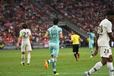 Kallang-Singapur - 28 Temmuz 2018: Mesut Ozil #10 oyuncu Arsenal icc2018 paris saint-Alman Ulusal Stadyumu'nda, Singapur karşı arsenal arasında sırasında eylem