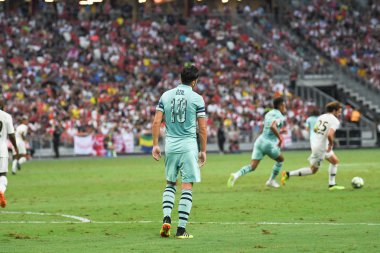 Kallang-Singapur - 28 Temmuz 2018: Mesut Ozil #10 oyuncu Arsenal icc2018 paris saint-Alman Ulusal Stadyumu'nda, Singapur karşı arsenal arasında sırasında eylem