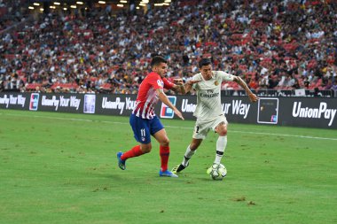 Kallang-Singapur-30Jul2018: Angel Di Maria # 11 PSG oyuncusu icc2018 'de Atletico Madrid ile Singapur' daki Paris Saint-Alman Ulusal Stadyumu 'nda karşı karşıya geldi.