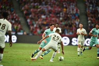 Kallang-Singapur - 28 Temmuz 2018: Mesut Ozil #10 oyuncu Arsenal icc2018 paris saint-Alman Ulusal Stadyumu'nda, Singapur karşı arsenal arasında sırasında eylem