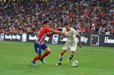Kallang-Singapur-30Jul2018: Angel Di Maria # 11 PSG oyuncusu icc2018 'de Atletico Madrid ile Singapur' daki Paris Saint-Alman Ulusal Stadyumu 'nda karşı karşıya geldi.