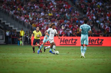 Kallang-Singapur-28Jul2018: Christopher Nkunku # 24 PSG Oyuncusu Buz 2018 'de Paris Saint-Alman Ulusal Stadyumu, Singgapur' daki cephaneliğe karşı savaşıyor