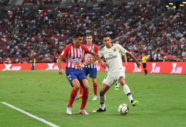Kallang-Singapur-30Jul2018: Angel Di Maria # 11 PSG oyuncusu icc2018 'de Atletico Madrid ile Singapur' daki Paris Saint-Alman Ulusal Stadyumu 'nda karşı karşıya geldi.