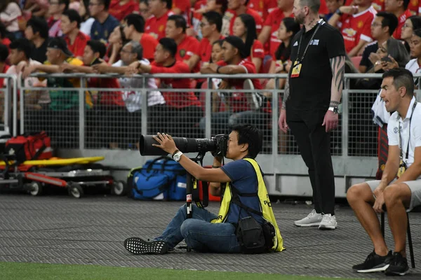 Kallang-singapore-20jul2019: fotógrafo oficial en acción dur — Foto de Stock