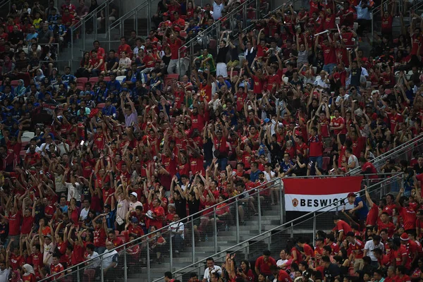 Каллуанг-Сінгапур-20юля 2019: невідомі фанати Манчестера одиниці — стокове фото