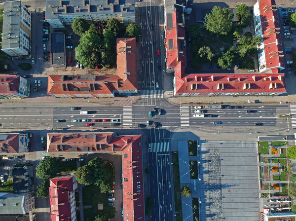 Aerial view on intersection with cars traffic in city Koszalin center.