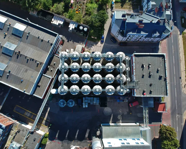 Aerial view on silo tank containers in the centre of city.