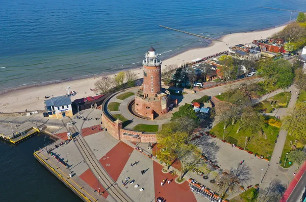 KOLOBRZEG, POLAND - 25 APRIL 2019 - Aerial view on Kolobrzeg city, area of Lighthouse at Baltic Sea shore and Ship Port. — Stock Photo, Image