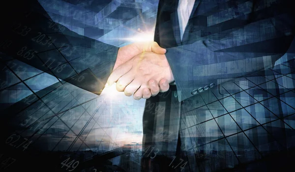 Double exposure of Businessmen shaking hands with business chart on abstract city background.