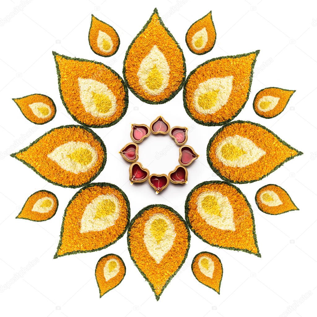 Flower Rangoli for Diwali or Onam festival over white background