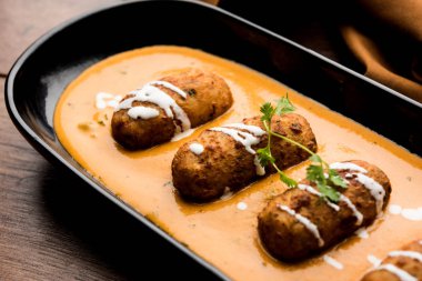 Malai köfte köri özel tarifi bir kasede servis bir Mughlai var. Seçici odak