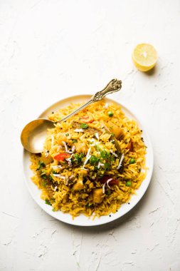 Masala pirinç veya masale bhat - baharatlı sebze kızarmış pilav / biryani veya Pulav genellikle sırasında yapılan düğün durumlarda maharashtra, Hindistan