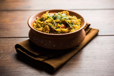 Masala pirinç veya masale bhat - baharatlı sebze kızarmış pilav / biryani veya Pulav genellikle sırasında yapılan düğün durumlarda maharashtra, Hindistan