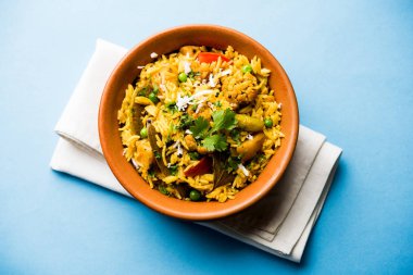 Masala pirinç veya masale bhat - baharatlı sebze kızarmış pilav / biryani veya Pulav genellikle sırasında yapılan düğün durumlarda maharashtra, Hindistan